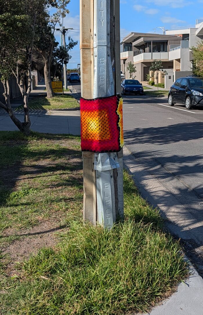 A wrapped pole on the walk to the bay